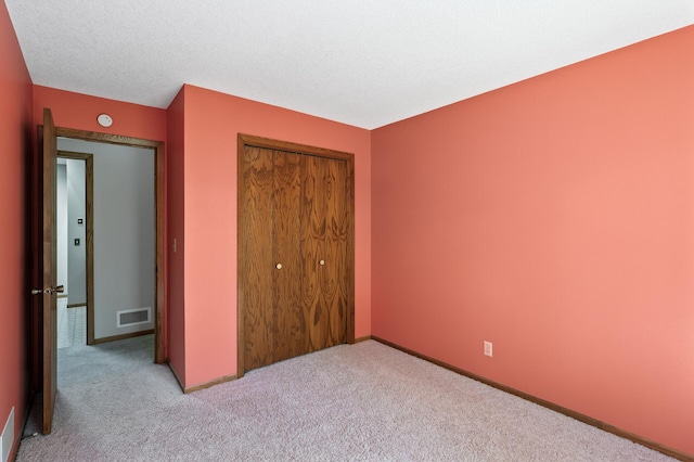 13838 Glendale Trl, Savage, MN 55378 - unfurnished bedroom with a closet, carpet, and baseboards