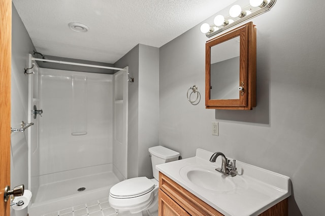 13838 Glendale Trl, Savage, MN 55378 - bathroom with a shower stall, toilet, vanity, and a textured ceiling