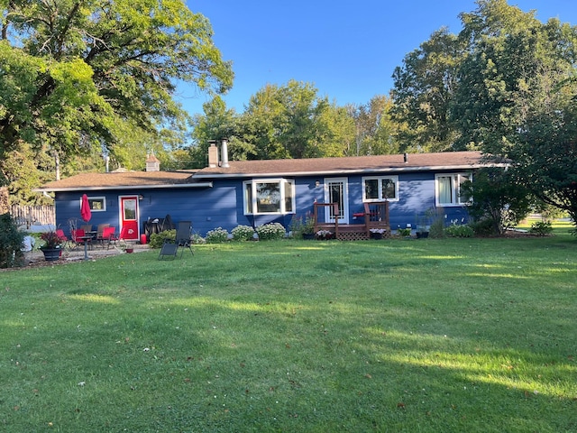 1778 Wabanica Bay Dr NW, Baudette, MN 56623 - ranch-style home featuring a chimney and a front yard