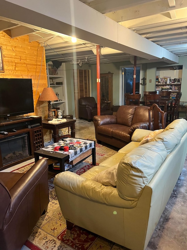 1778 Wabanica Bay Dr NW, Baudette, MN 56623 - living area with concrete flooring and wood walls