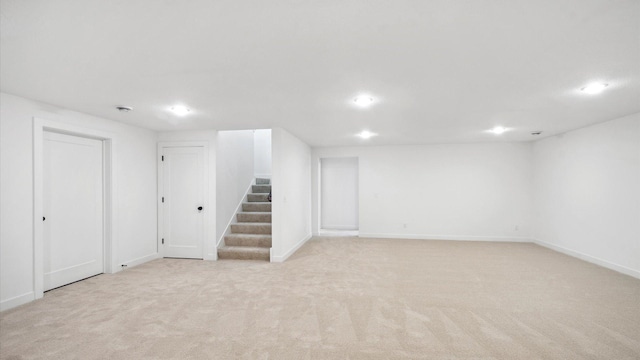 2133 Westpointe Dr, Hastings, MN 55033 - finished below grade area with stairway, recessed lighting, light carpet, and baseboards