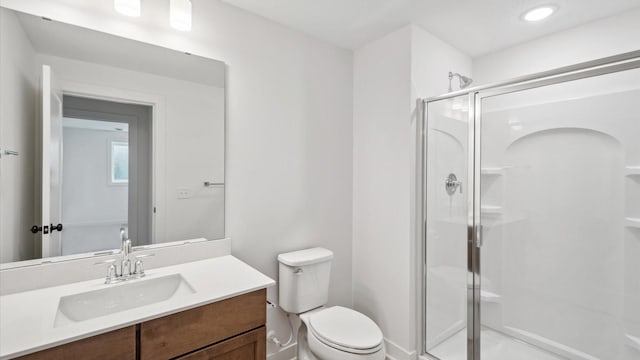 2133 Westpointe Dr, Hastings, MN 55033 - full bathroom featuring toilet, a stall shower, vanity, and recessed lighting