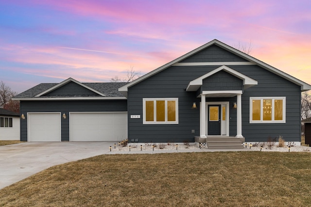 575 Elins Lake Rd SE, Cambridge, MN 55008 - single story home with driveway, an attached garage, a front yard, and a shingled roof