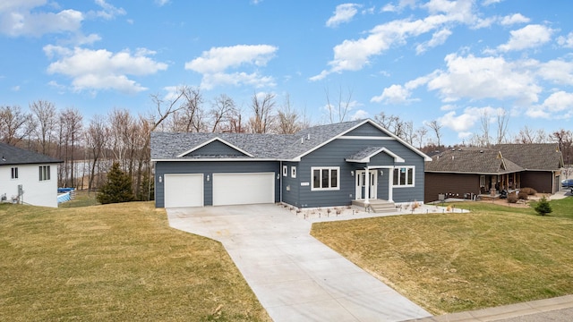 575 Elins Lake Rd SE, Cambridge, MN 55008 - single story home with driveway, a garage, a front yard, and roof with shingles
