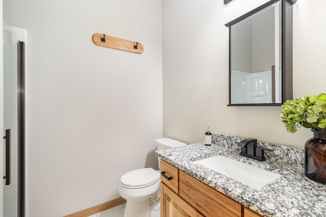 575 Elins Lake Rd SE, Cambridge, MN 55008 - bathroom featuring vanity, toilet, and a shower