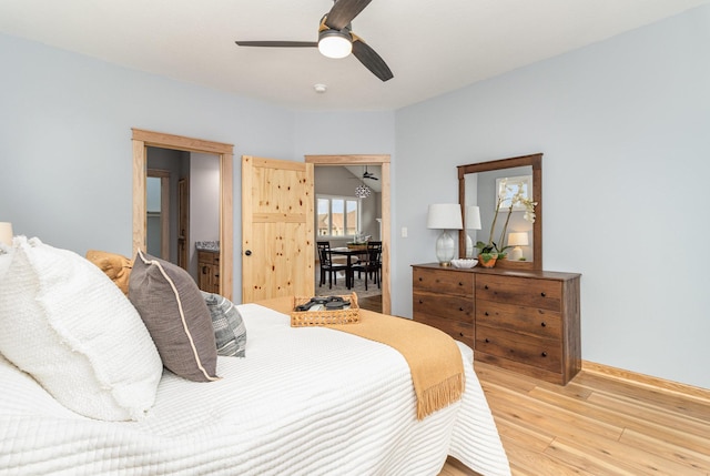 575 Elins Lake Rd SE, Cambridge, MN 55008 - bedroom featuring light wood-style flooring, baseboards, and a ceiling fan