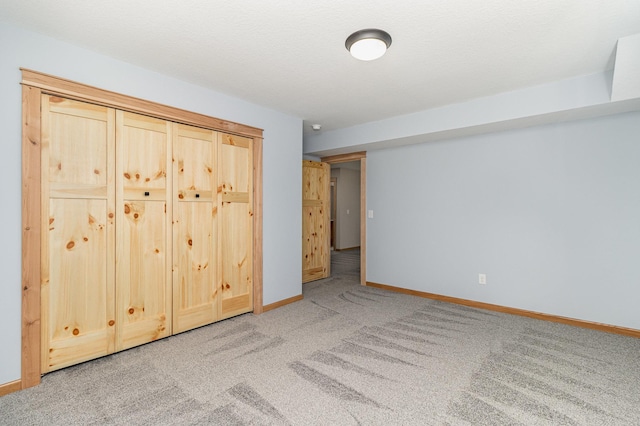 575 Elins Lake Rd SE, Cambridge, MN 55008 - unfurnished bedroom featuring light colored carpet and baseboards