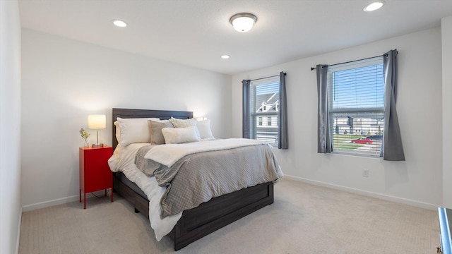 bedroom featuring baseboards, carpet, and recessed lighting