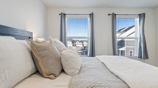 bedroom featuring multiple windows