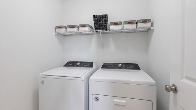 laundry area with laundry area and washer and dryer