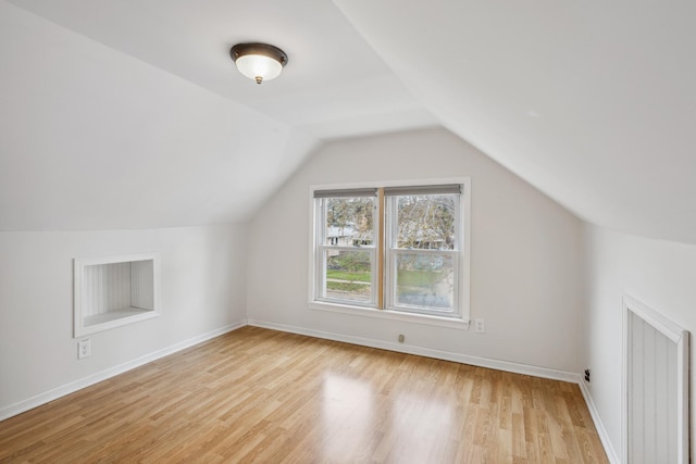 178 Mainzer St, West Saint Paul, MN 55118 - bonus room with light wood-style floors, baseboards, and lofted ceiling