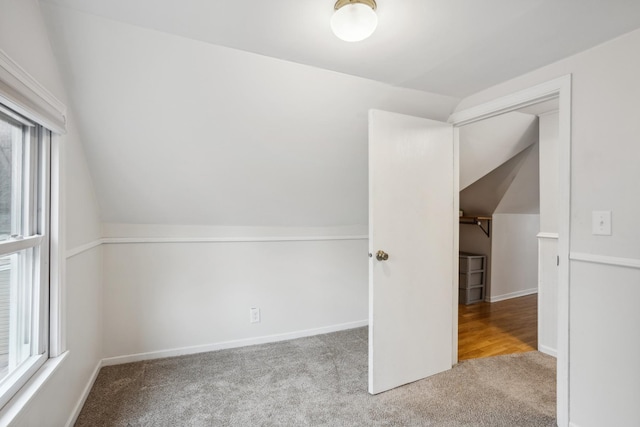 178 Mainzer St, West Saint Paul, MN 55118 - additional living space featuring carpet floors, baseboards, and lofted ceiling