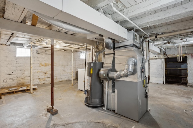 178 Mainzer St, West Saint Paul, MN 55118 - below grade area featuring washer / dryer, heating unit, and water heater