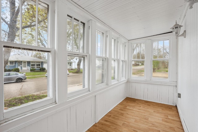 178 Mainzer St, West Saint Paul, MN 55118 - unfurnished sunroom with wooden walls and wood finished floors