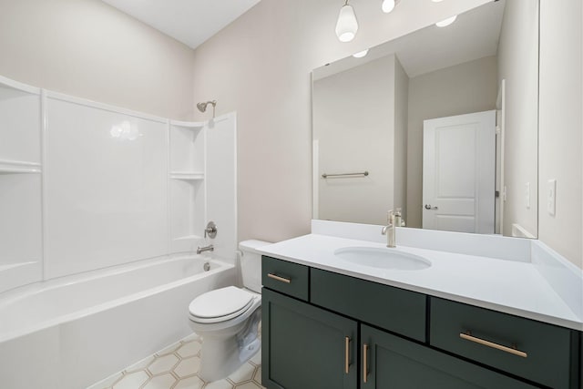 bathroom with washtub / shower combination, toilet, and vanity