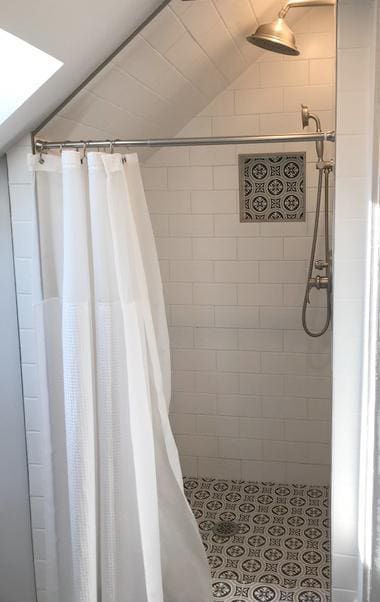 2715 Marshall St NE, Minneapolis, MN 55418 - bathroom with lofted ceiling and a stall shower