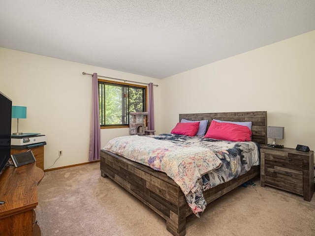 4237 Centerville Rd, Vadnais Heights, MN 55127 - bedroom featuring light carpet, a textured ceiling, and baseboards