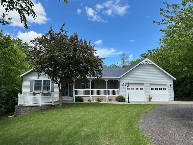 12114 260th St, Saint Cloud, MN 56301 - view of front of house with a porch, an attached garage, asphalt driveway, and a front yard