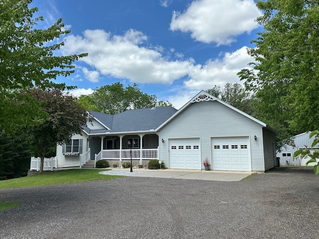 12114 260th St, Saint Cloud, MN 56301 - view of front of house featuring covered porch and a garage