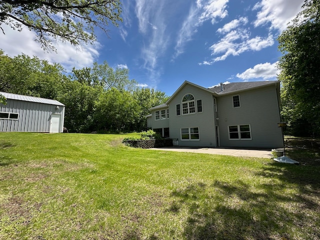 12114 260th St, Saint Cloud, MN 56301 - back of house with a patio and a yard