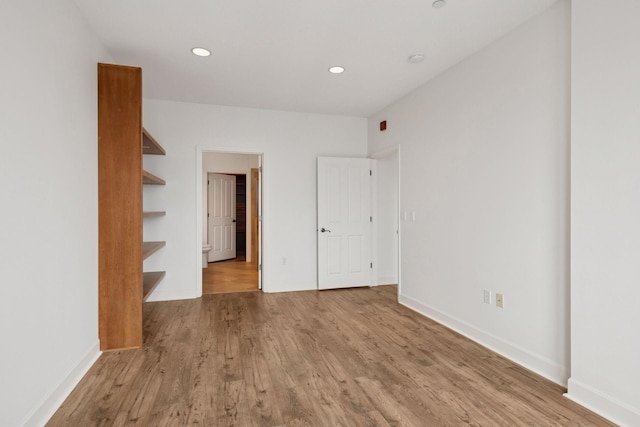 500 Grant St Unit 2707, Minneapolis, MN 55404 - empty room featuring wood finished floors, baseboards, and recessed lighting