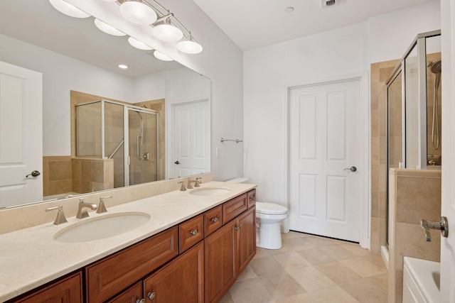 500 Grant St Unit 2707, Minneapolis, MN 55404 - full bath featuring a stall shower, double vanity, tile patterned floors, and toilet