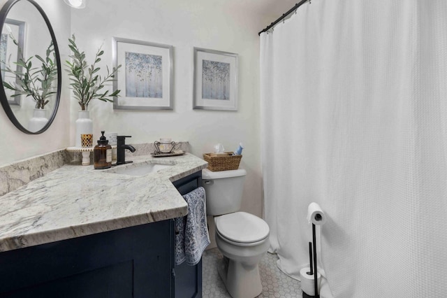 16137 Ahrens Hill Rd, Brainerd, MN 56401 - full bath with vanity, toilet, and tile patterned flooring