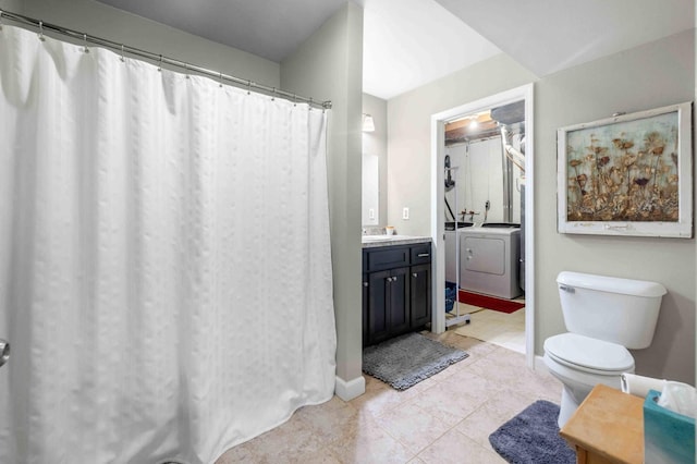 16137 Ahrens Hill Rd, Brainerd, MN 56401 - bathroom featuring washer and dryer, toilet, vanity, tile patterned floors, and curtained shower
