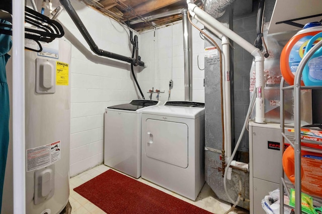 16137 Ahrens Hill Rd, Brainerd, MN 56401 - laundry area with washer and dryer, water heater, and heating unit