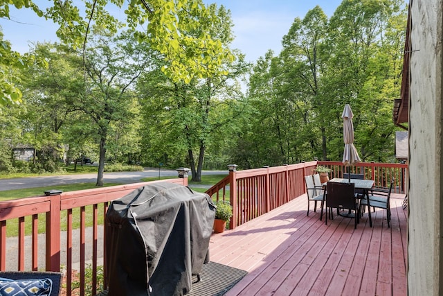 16137 Ahrens Hill Rd, Brainerd, MN 56401 - wooden deck featuring outdoor dining area and grilling area