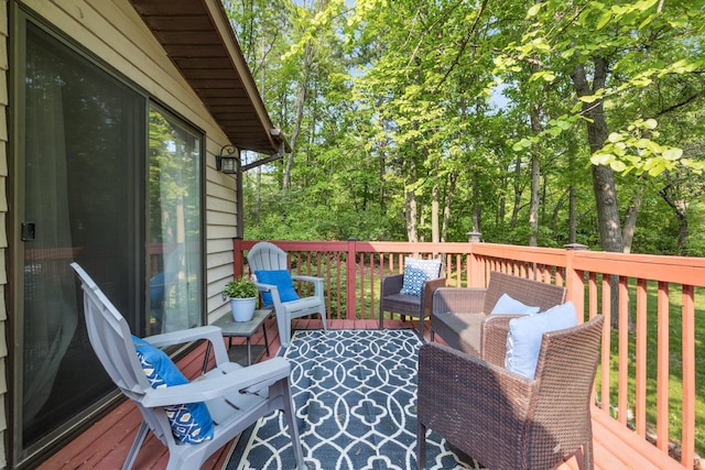 16137 Ahrens Hill Rd, Brainerd, MN 56401 - wooden terrace featuring view of wooded area
