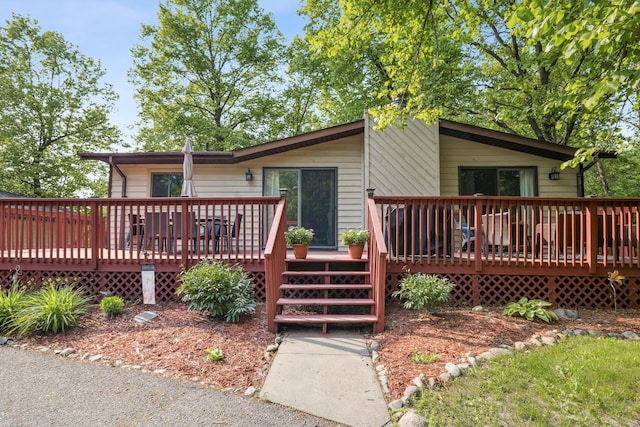 16137 Ahrens Hill Rd, Brainerd, MN 56401 - view of front facade featuring a wooden deck