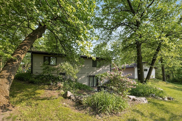 16137 Ahrens Hill Rd, Brainerd, MN 56401 - back of property with a lawn and an outbuilding