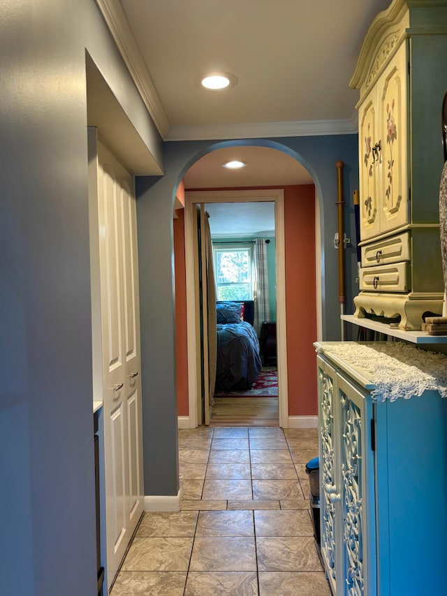 709 Riverside Dr N, North Hudson, WI 54016 - hall with arched walkways, baseboards, and crown molding