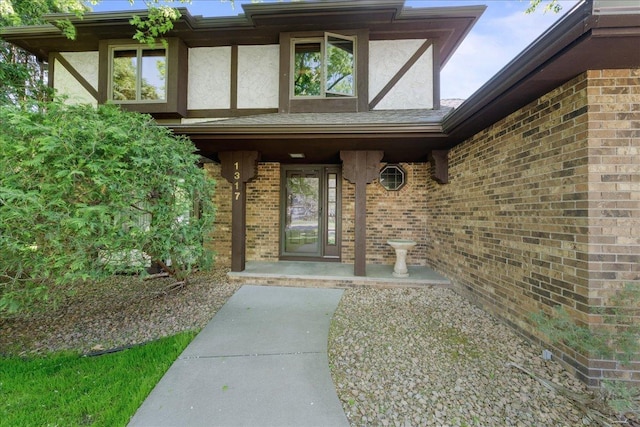 1317 Waterford Rd, Woodbury, MN 55125 - property entrance featuring stucco siding and brick siding