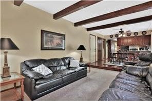 1317 Waterford Rd, Woodbury, MN 55125 - living room with carpet floors and beam ceiling