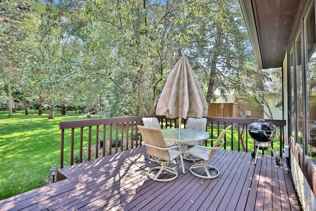 1317 Waterford Rd, Woodbury, MN 55125 - wooden deck with outdoor dining area and a lawn