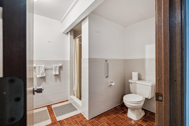 93 County 49 NW, Pine River, MN 56474 - bathroom featuring tile walls, tile patterned floors, toilet, a shower with curtain, and wainscoting