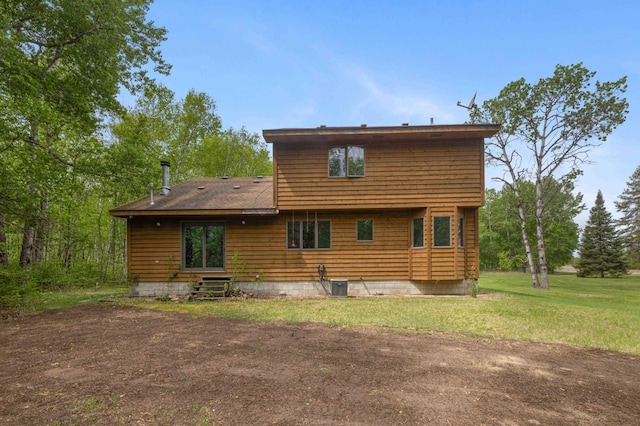 93 County 49 NW, Pine River, MN 56474 - rear view of property featuring cooling unit and a lawn