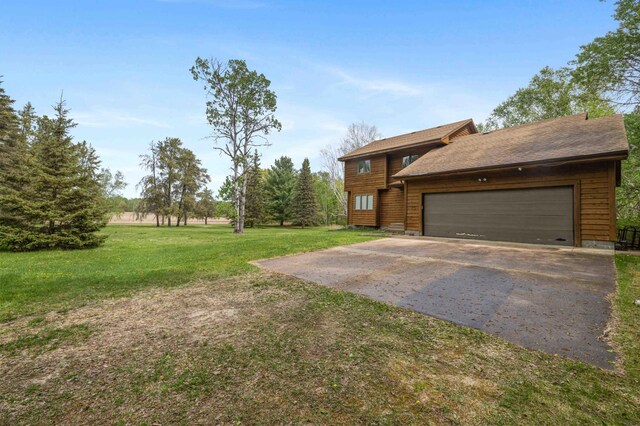 93 County 49 NW, Pine River, MN 56474 - view of green lawn with driveway and a garage
