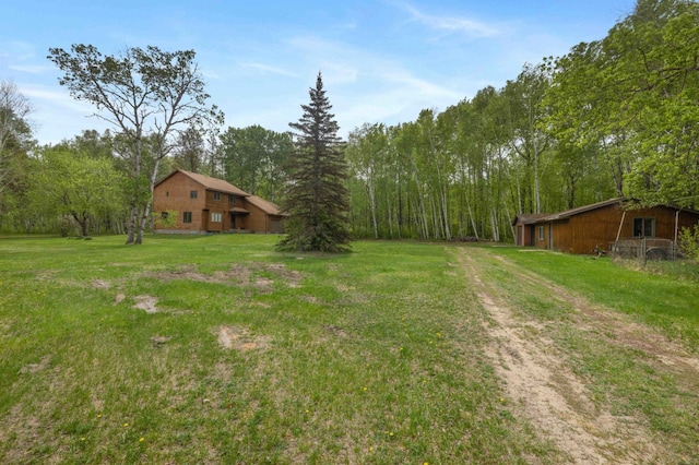 93 County 49 NW, Pine River, MN 56474 - view of green lawn featuring dirt driveway