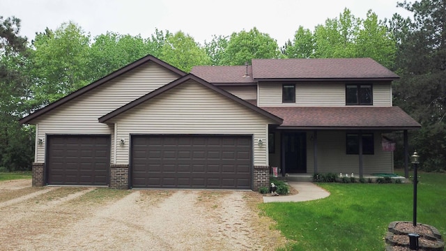 19988 Quentin Ave, Ravenna Twp, MN 55033 - view of front of home with brick siding, a front lawn, and dirt driveway