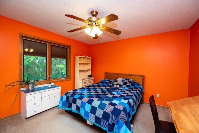 19988 Quentin Ave, Ravenna Twp, MN 55033 - bedroom featuring carpet floors, ceiling fan, baseboards, and a textured ceiling