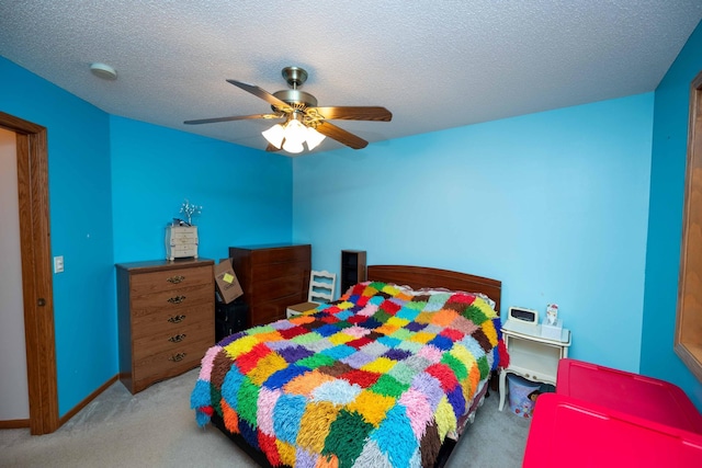 19988 Quentin Ave, Ravenna Twp, MN 55033 - carpeted bedroom with ceiling fan, a textured ceiling, and baseboards
