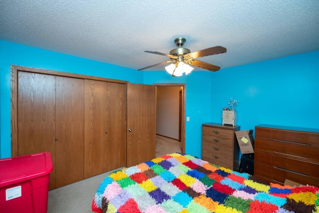 19988 Quentin Ave, Ravenna Twp, MN 55033 - carpeted bedroom featuring a closet, a ceiling fan, and a textured ceiling