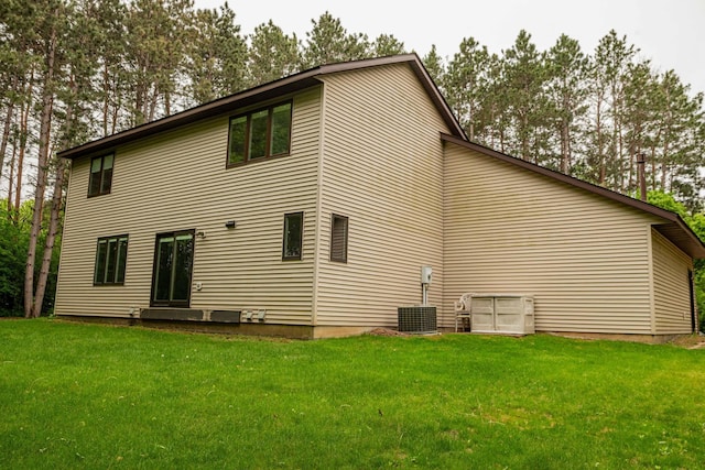 19988 Quentin Ave, Ravenna Twp, MN 55033 - rear view of house featuring a yard