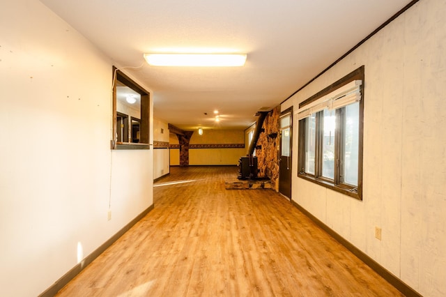 1002 11th Ave W, Alexandria, MN 56308 - hallway featuring wood finished floors and baseboards