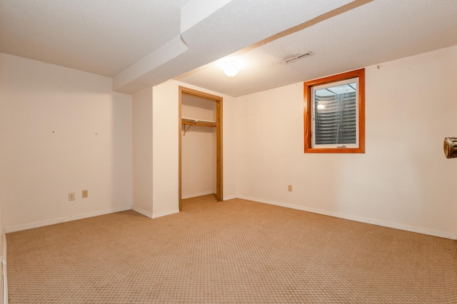 1002 11th Ave W, Alexandria, MN 56308 - unfurnished bedroom with light carpet and a closet
