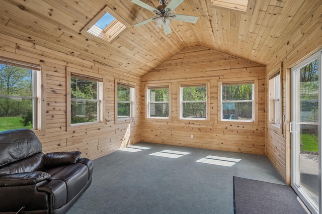 sunroom with a healthy amount of sunlight and a skylight