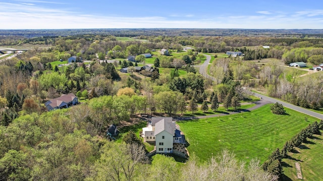 bird's eye view with a forest view